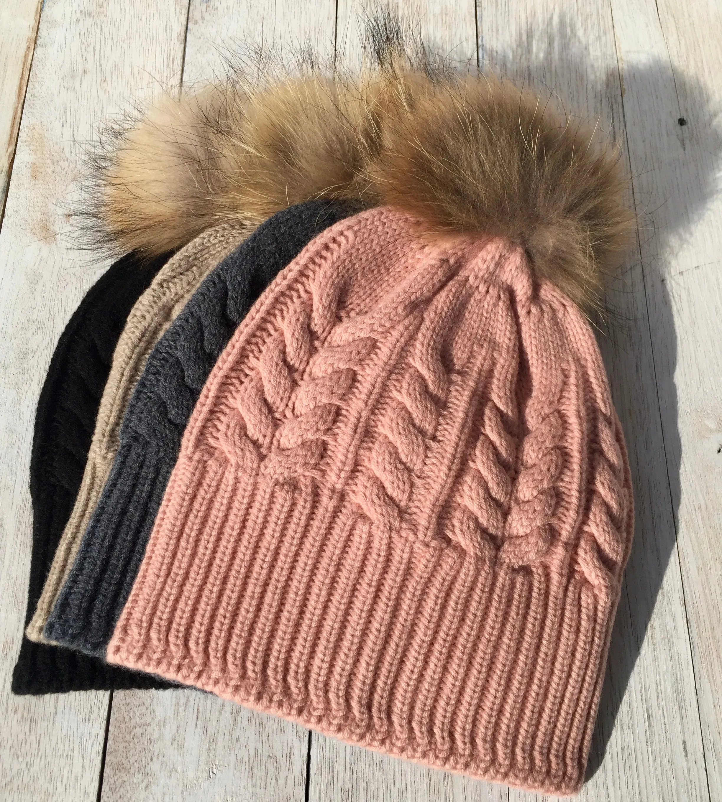 Absolutely. I'M in!  100% Pure Merino Wool Jumbo Cable Beanie with detachable Raccoon Fur Pom Pom, Biscuit